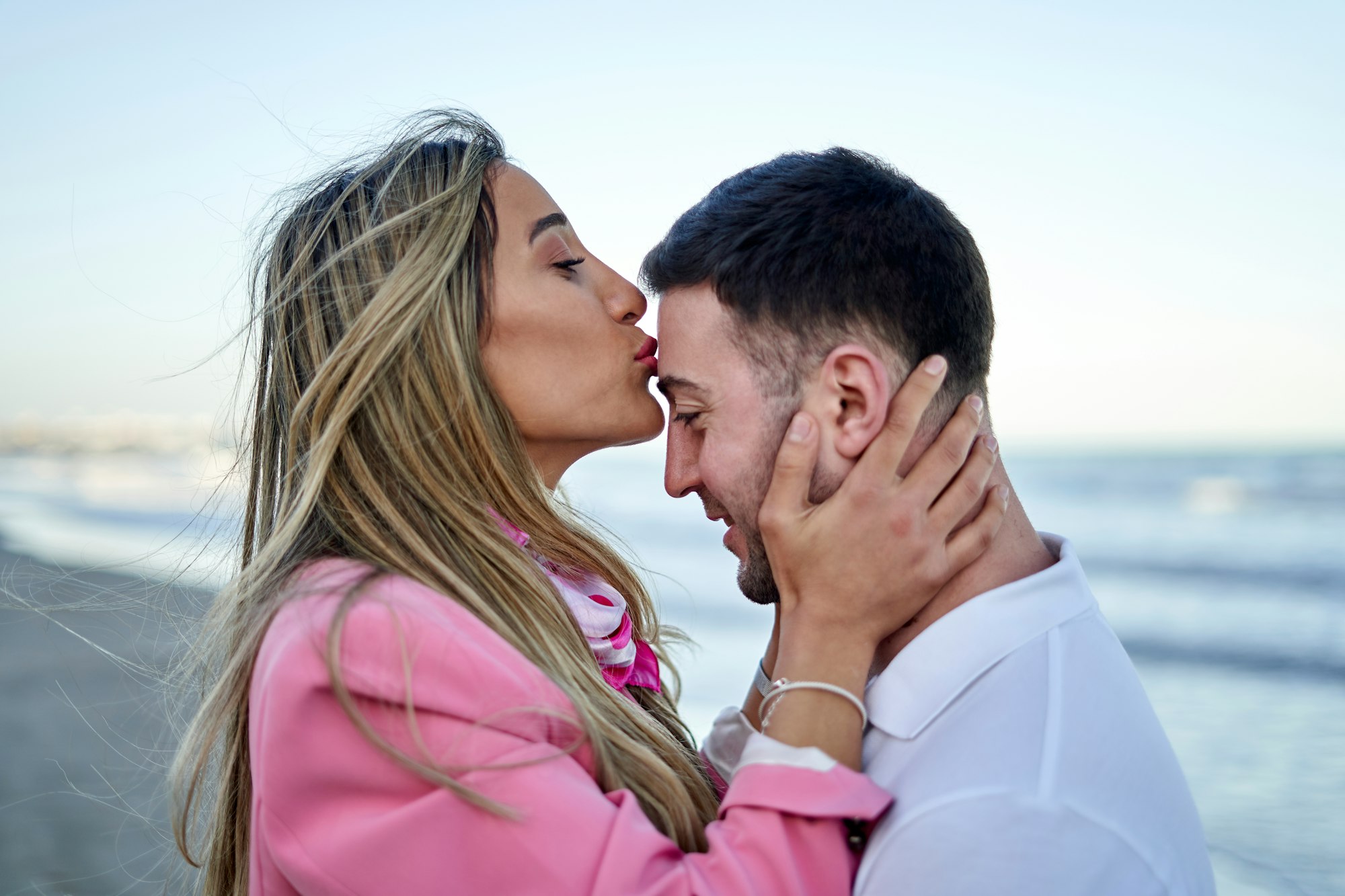 Romantic couple enjoying the beach